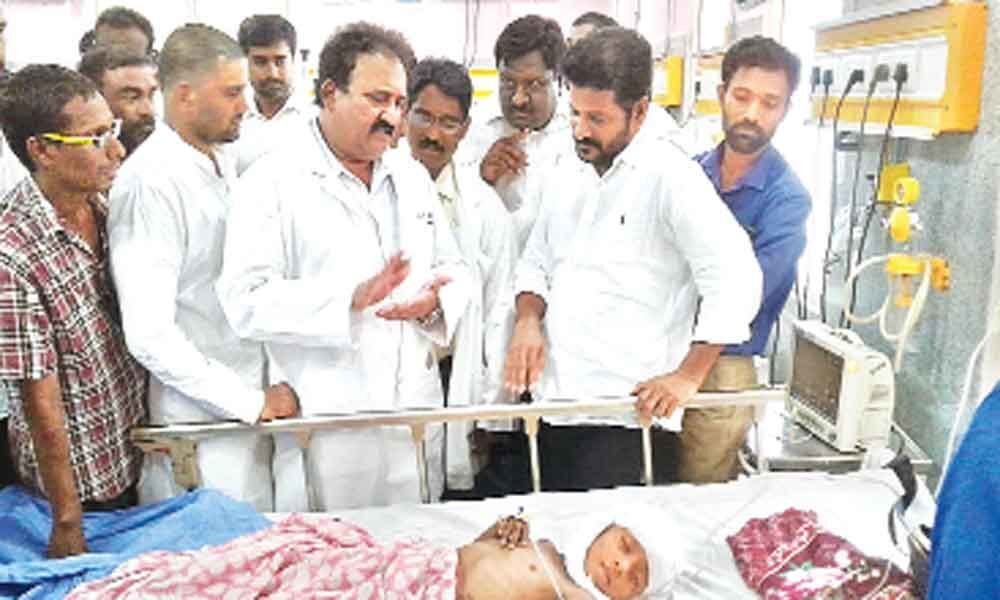 Revanth Reddy visits dog-bite victim