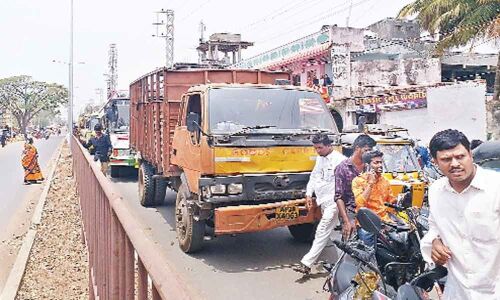 Irate people protest with empty pots