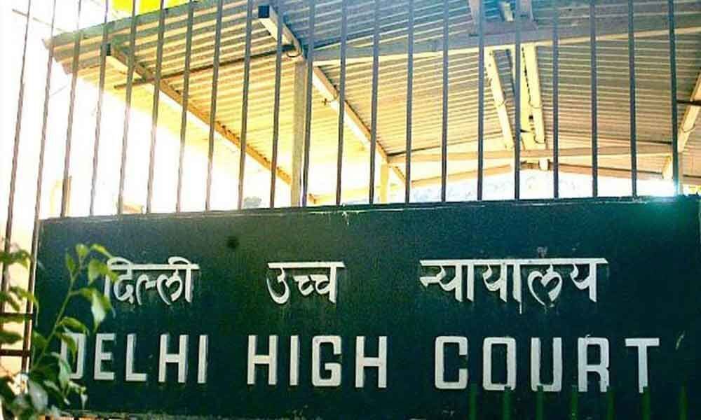 Delhi High Court seeks Raja, others response on 2G early hearing plea