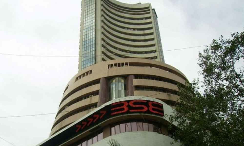 Markets end in red on global cues