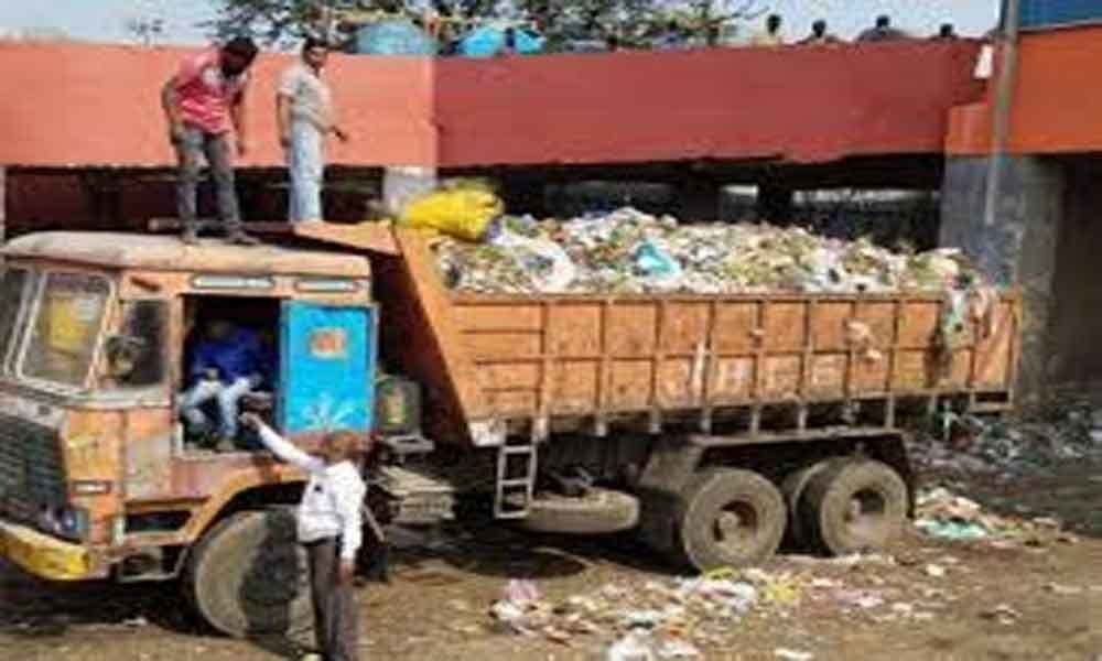 Protest against GHMC garbage vehicle entry