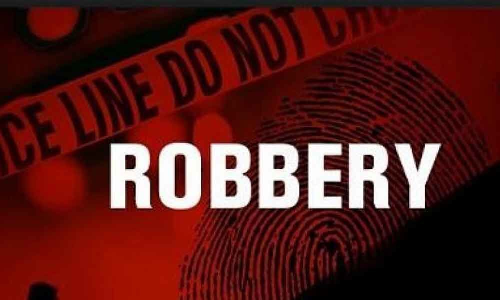 Thieves stolen gold and cash worth Rs 5 lakh from a house in Keesara PS limits