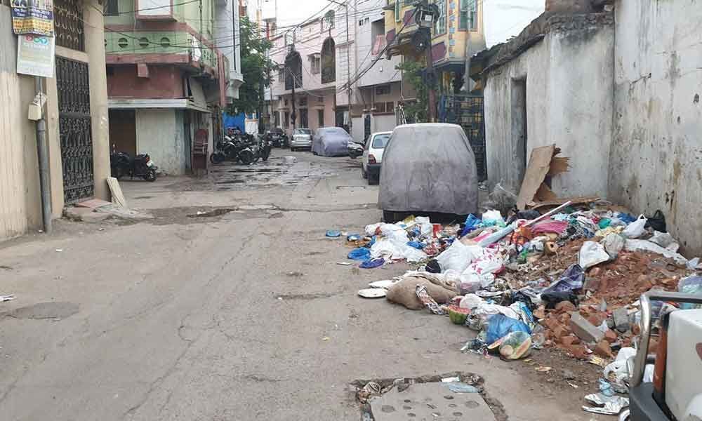 Residents raise stink over piled-up garbage