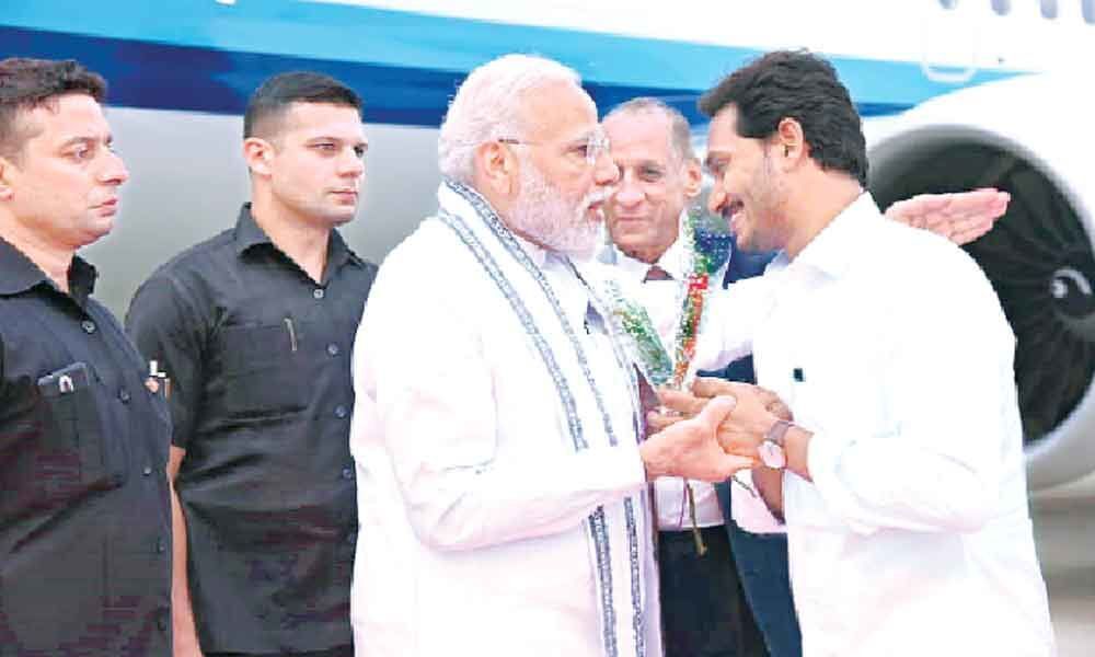 CM Jagan bends, lends ear to Modi