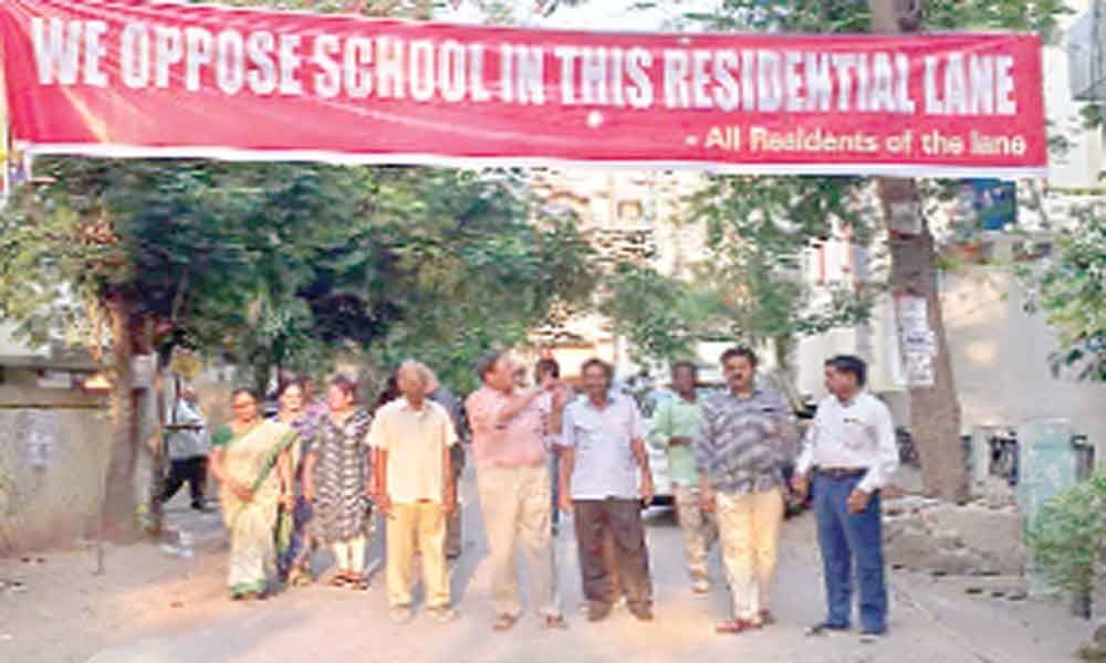 Stir against schools in residential colonies