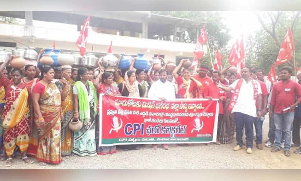 Women stage protest with empty pots in Mahabubabad