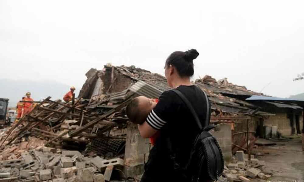 12 die as quakes rock South China