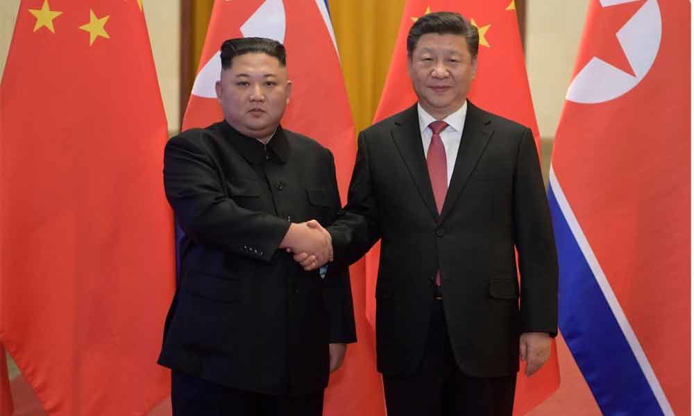 Xi Jinping arrives in North Korea for summit with Kim