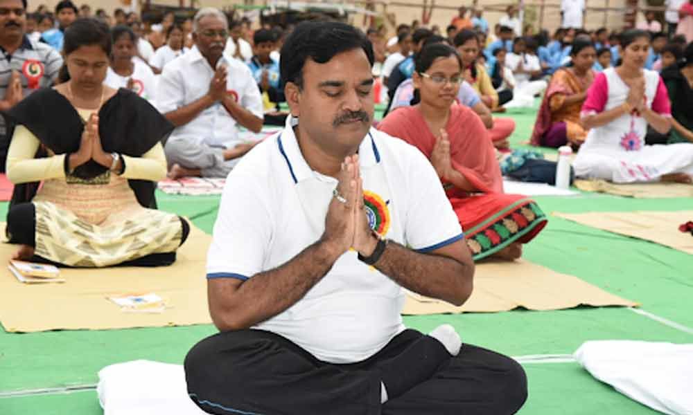 Deputy CM Amzath Basha participates in Yoga program