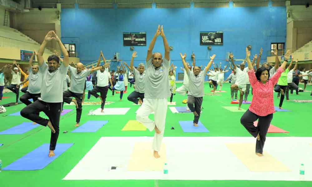 Railway staff celebrate yoga day with gaiety