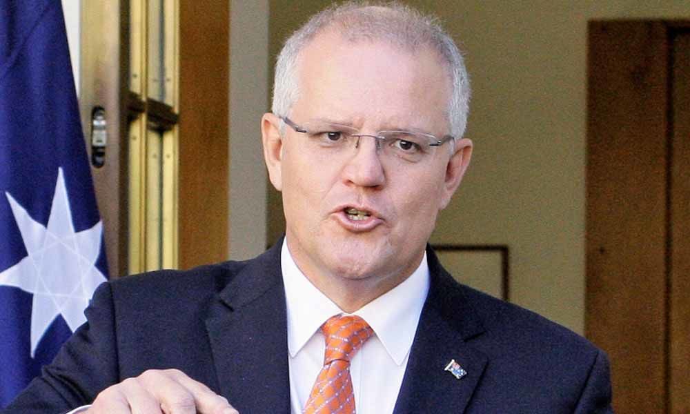 Australia warns of collateral damage from US-China trade war