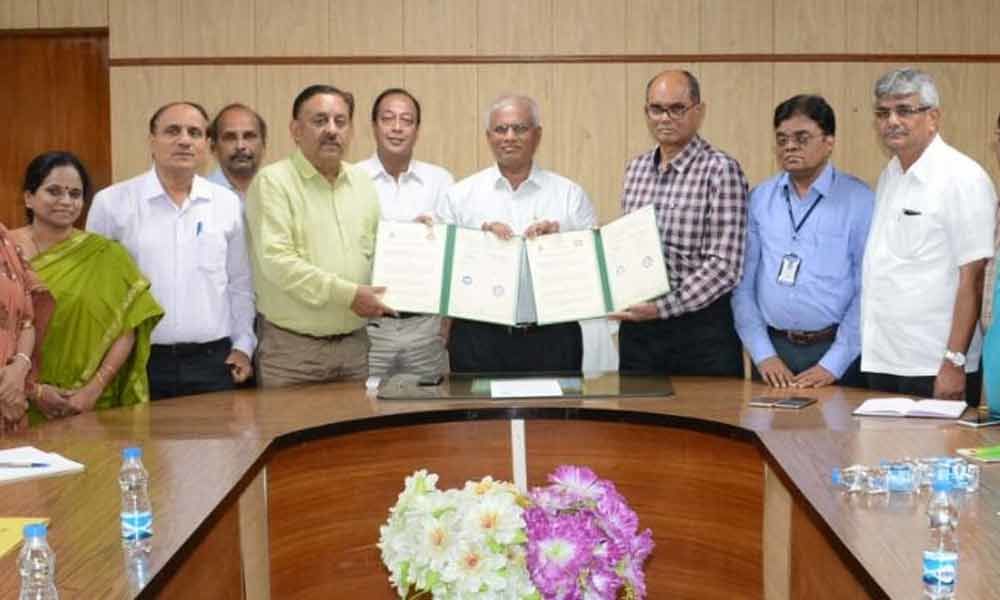 PJTSAU signs MoU with ITC Paper Board