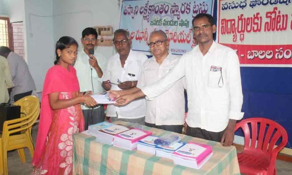 Notebooks distributed to students: MLC Ramu Suryarao