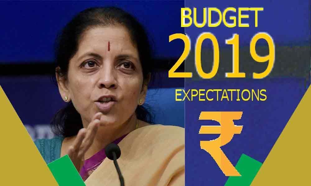 KPMG Pre-Budget Survey : Hike in I-T exemption level, tax on high income likely
