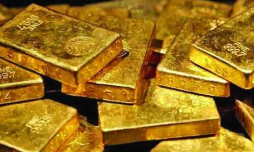 Gold prices drop marginally