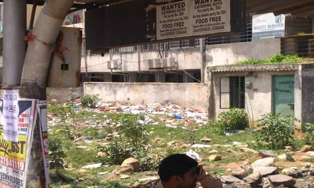 Heaps of garbage piling up on vacant land