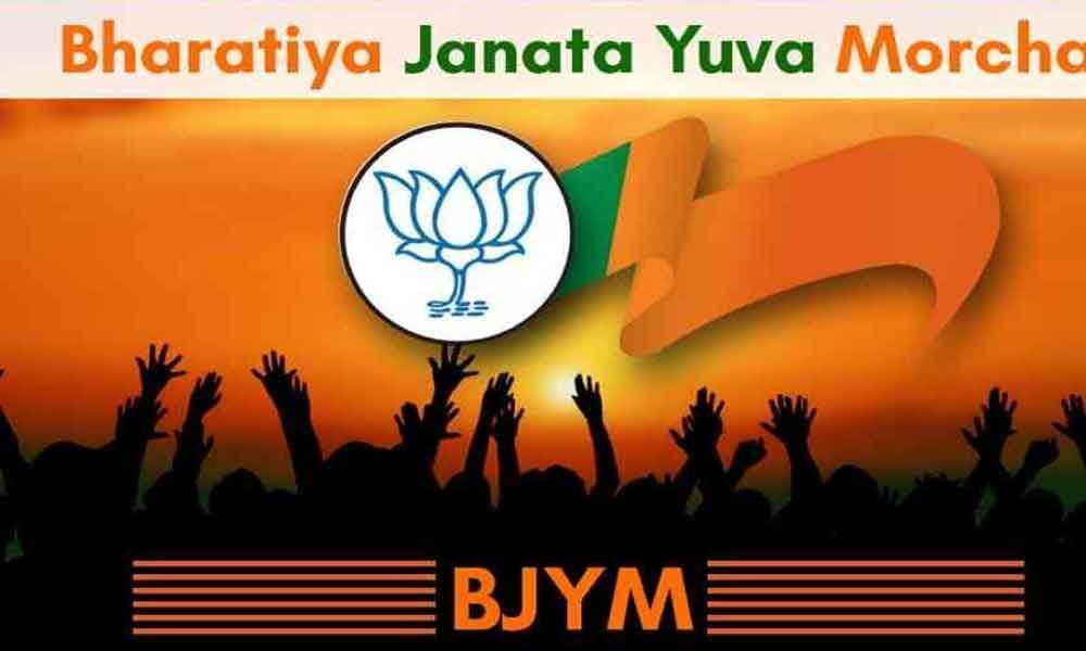 BJYM leaders staged protest against  making education a business