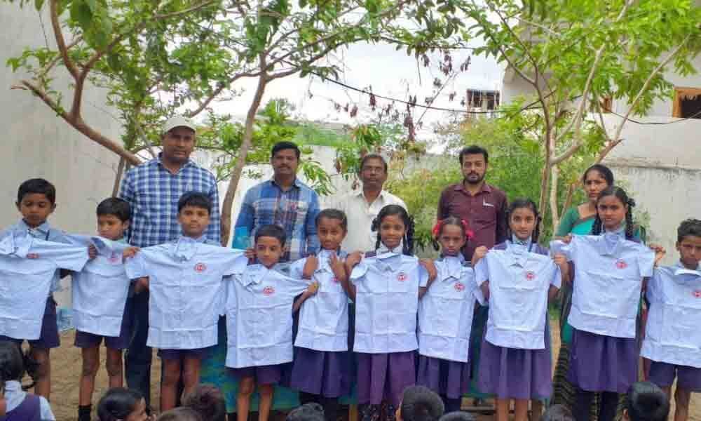 Uniform, stationary donated to govt school students in Sircilla