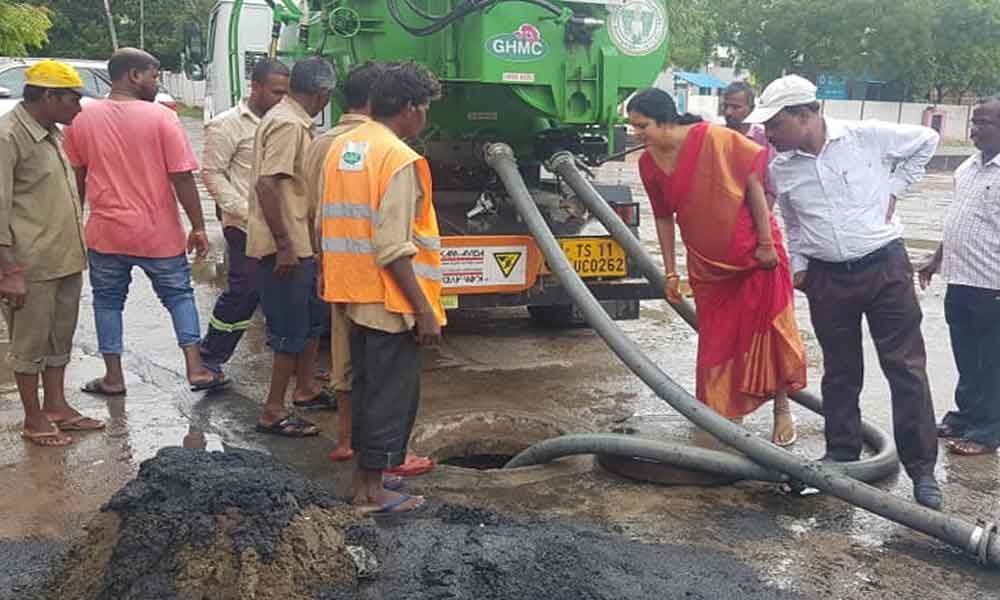 Corporator inspects silt removal work