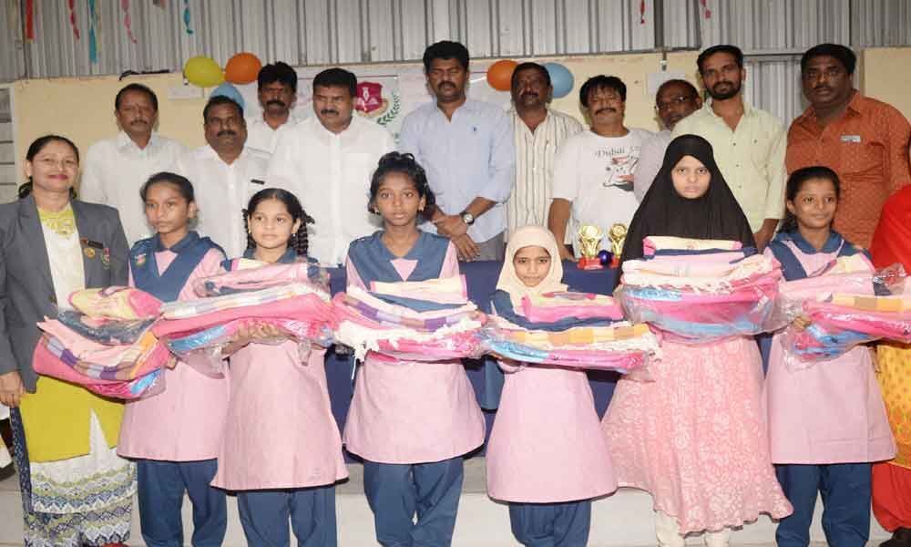 MLA Muta Gopal distributes uniforms to minority gurukul students