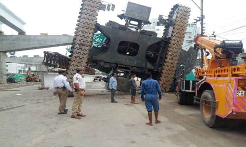 Crane tumbled at Tolichowki flyover bridge