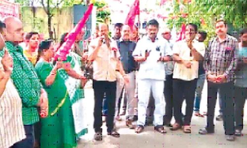 Railway employees stage protest