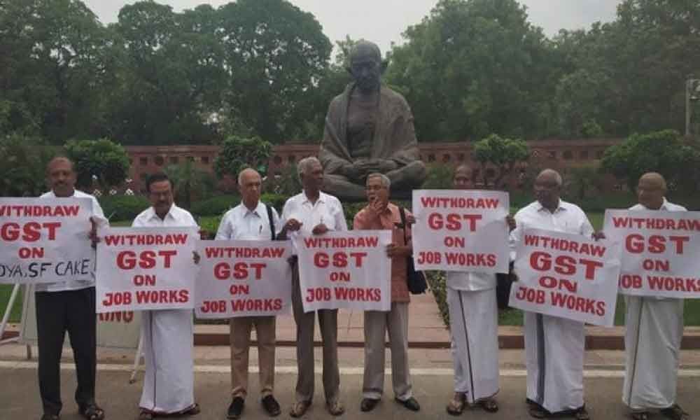 Communist Party of India(M) MPs protest in Delhi against GST on job works