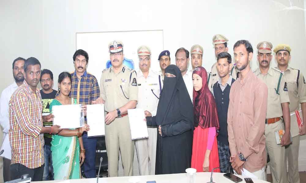 Families of deceased home guards get insurance cheques