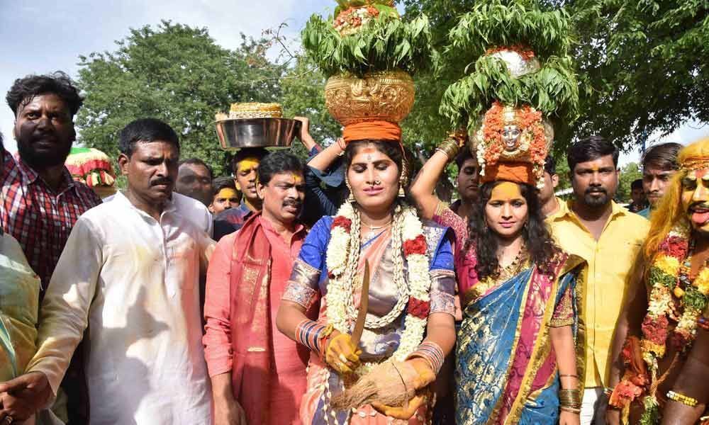 Devotees Participating In Bonalu Procession At Golconda Fort On Thursday