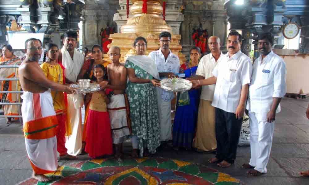 Devotees present 1 lakh worth silver ornaments to Bhadradri Lord