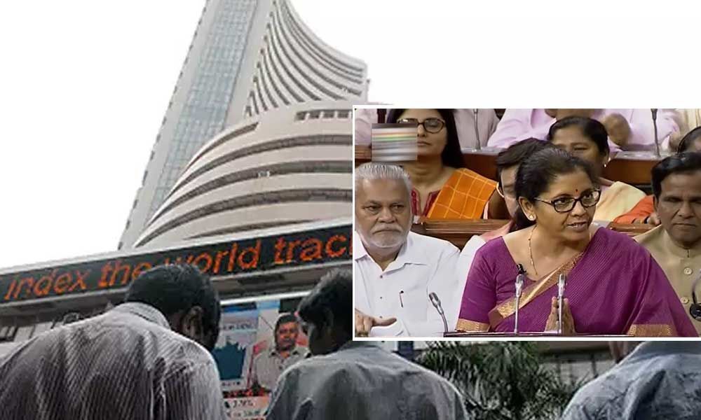 Sensex cracks over 450 pts; power, metal stocks sink