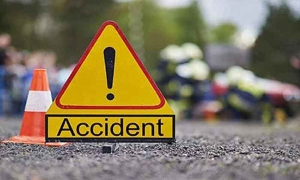 One dead, five injured in truck-car collision