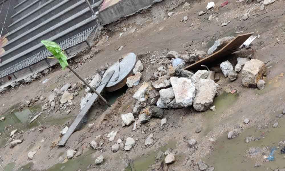 Commuters fume over muddy road