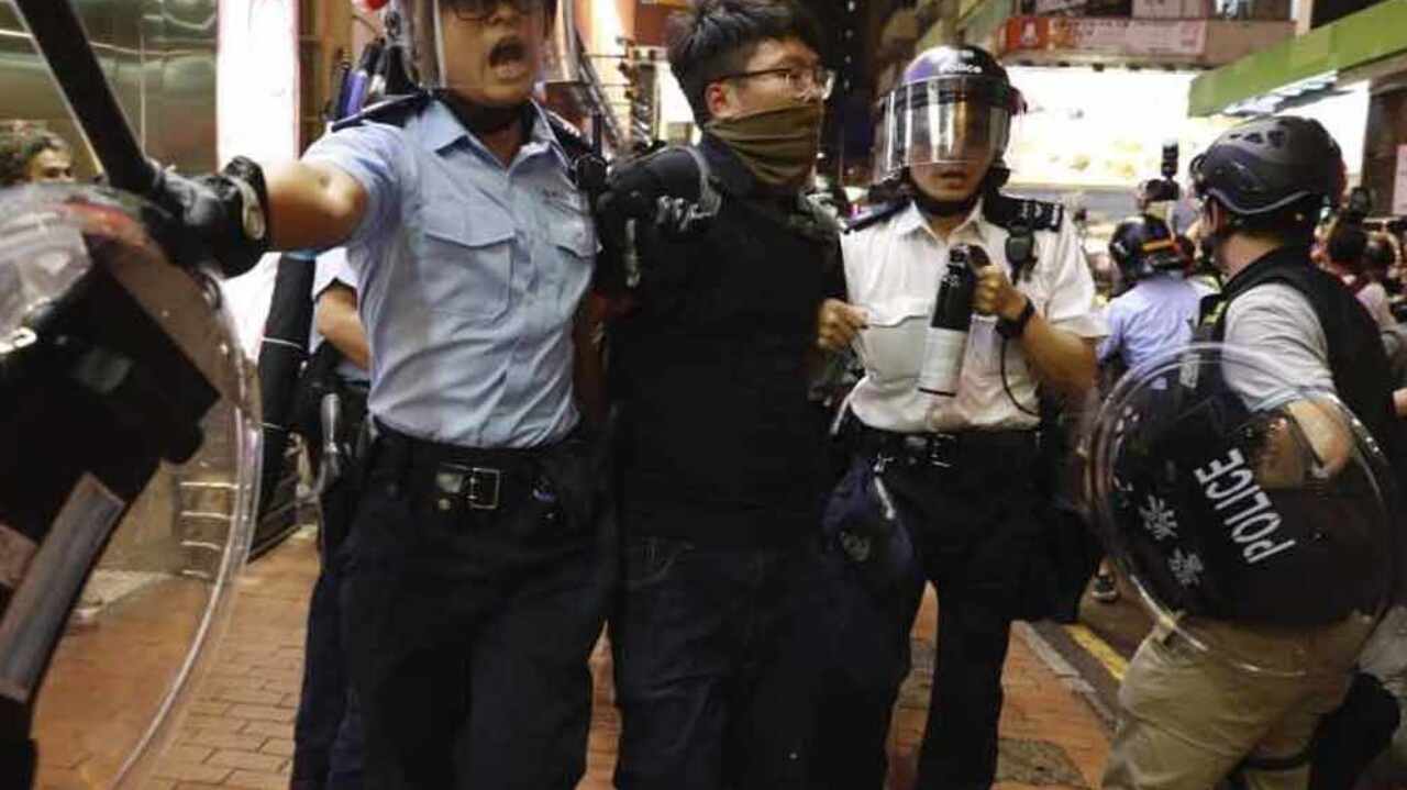 Hong Kong police arrest six after new night of clashes