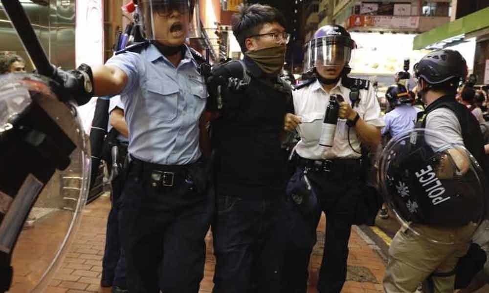Hong Kong police arrest six after new night of clashes