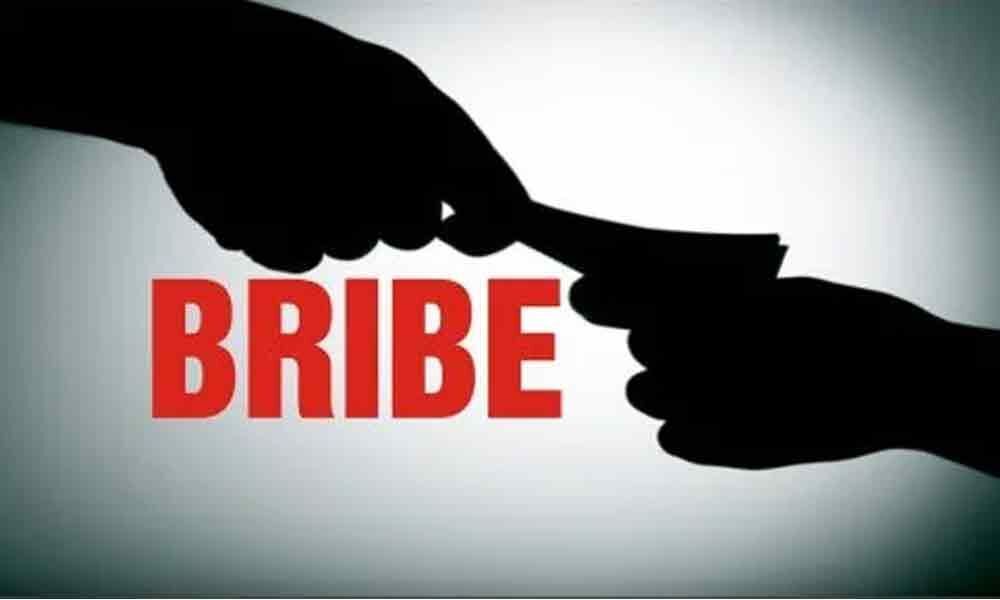 Hyderabad: Assistant Registrar, Inspector held for accepting bribe