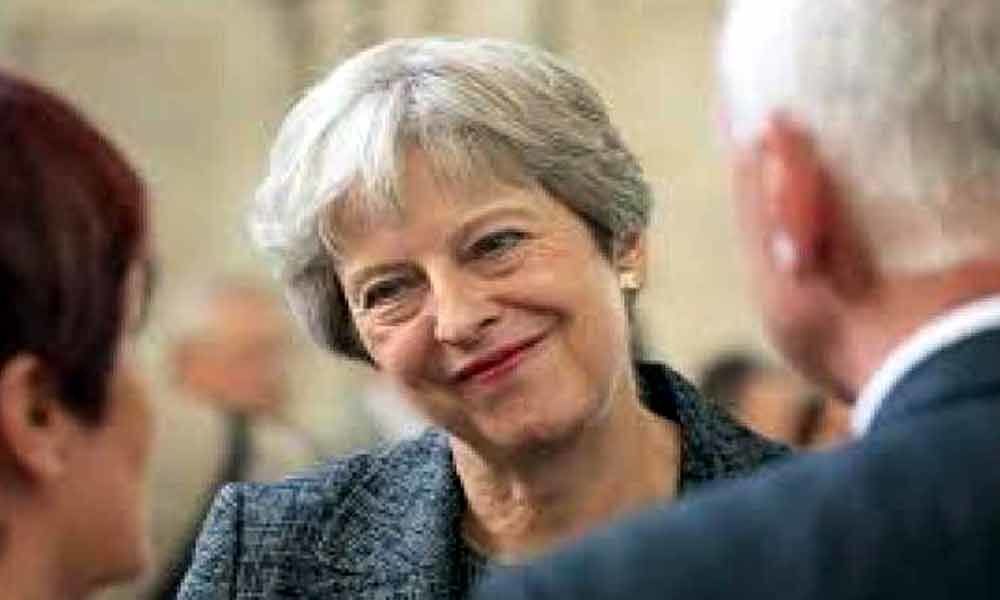 Theresa May backs British envoy in US despite Trump snub