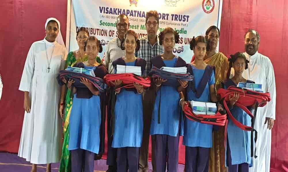 VPT distributes notebooks, bags to school children