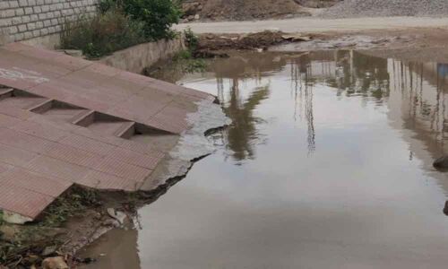 Lane inundated by drainage water