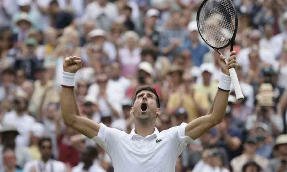 Top seed Djokovic reaches semi-finals at Wimbledon