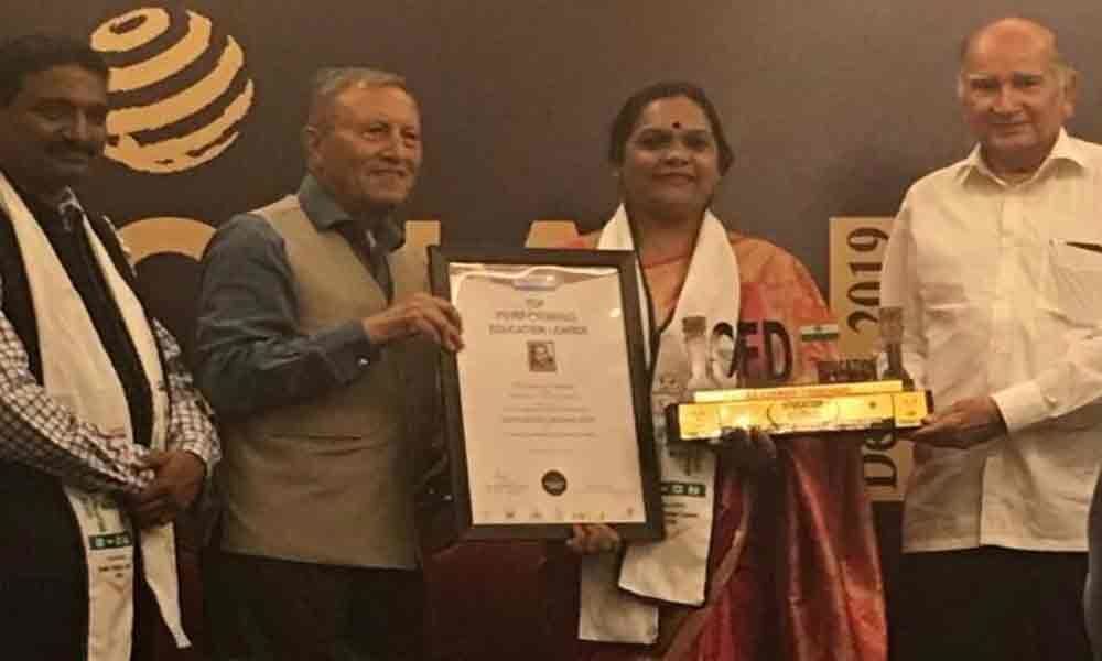 DPS principal bags Education Legend 2019 award