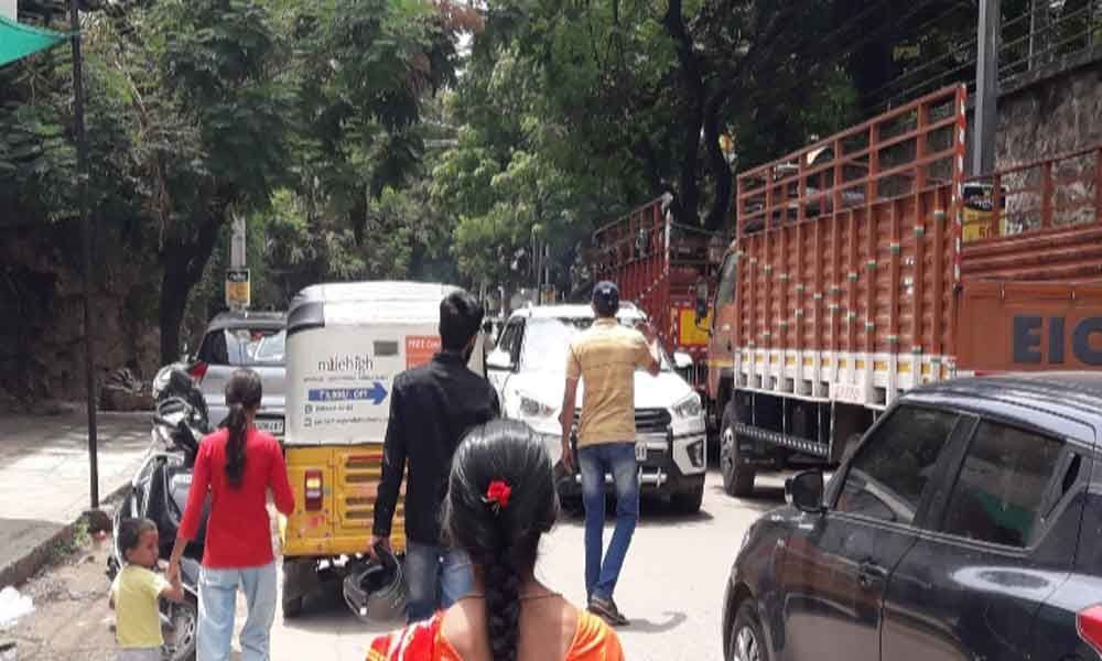 Unauthorised parking shrinks pedestrian way