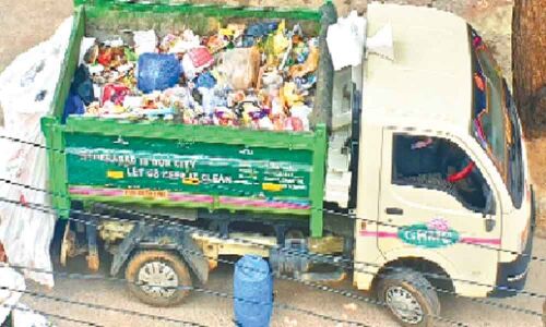 GHMC vans not removing garbage, lament locals