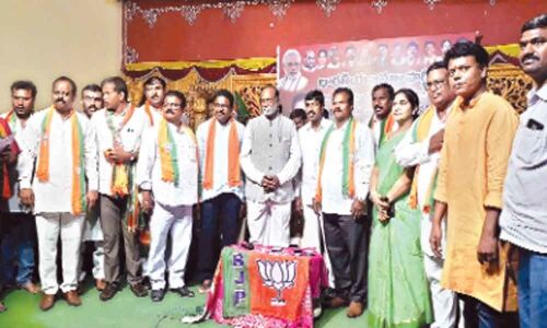 Several people take BJP membership