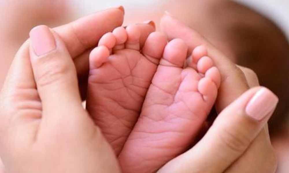 Woman delivers baby on road in Hyderabad
