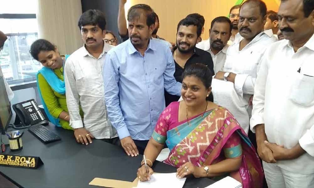MLA K Roja took charge as APIIC chairperson