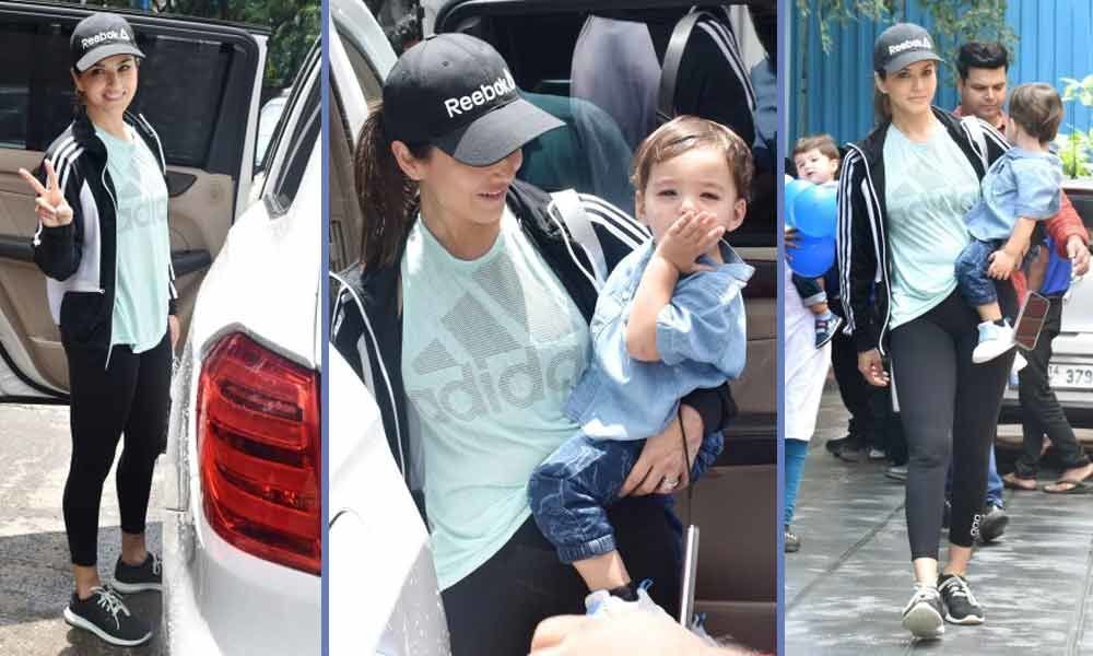 Sunny Leone spruced up her casual look in tee and tights while on a play date with her sons