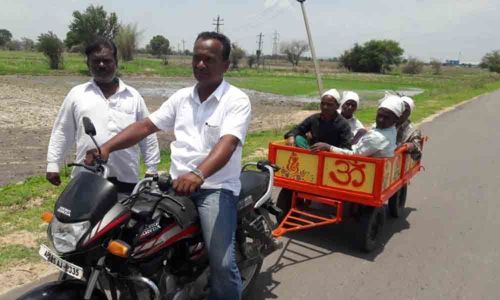 Farmer invents bike trolley for transportation