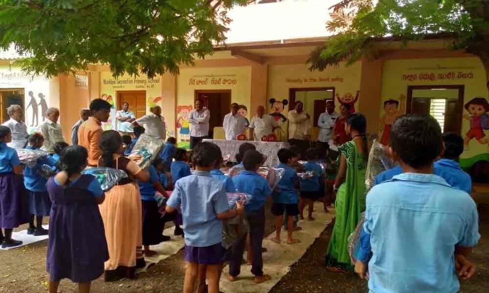School bags, T-shirts distributed by GMC