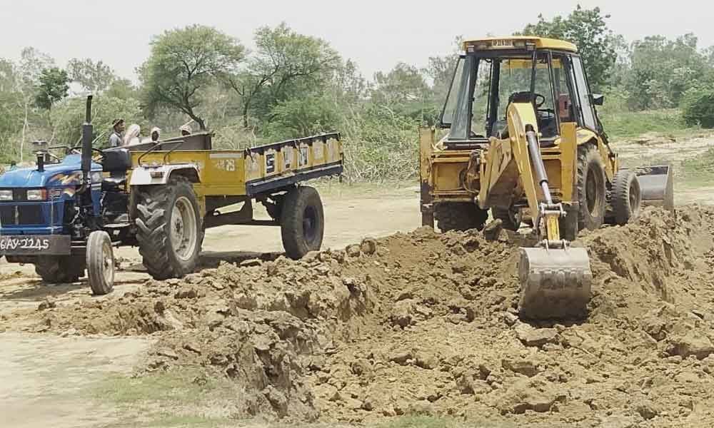 Officials urged to curb illegal transport of mud